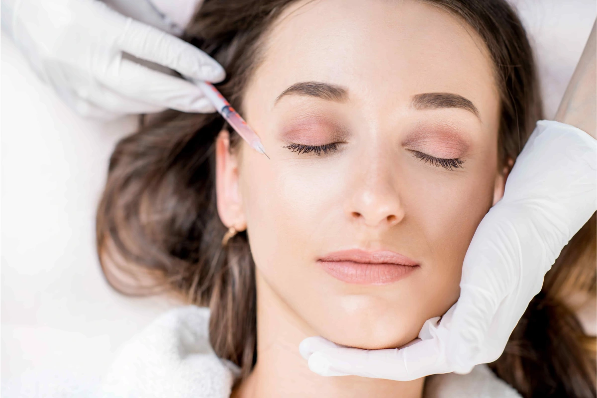 Woman receiving injectable fine lines and wrinkles treatment